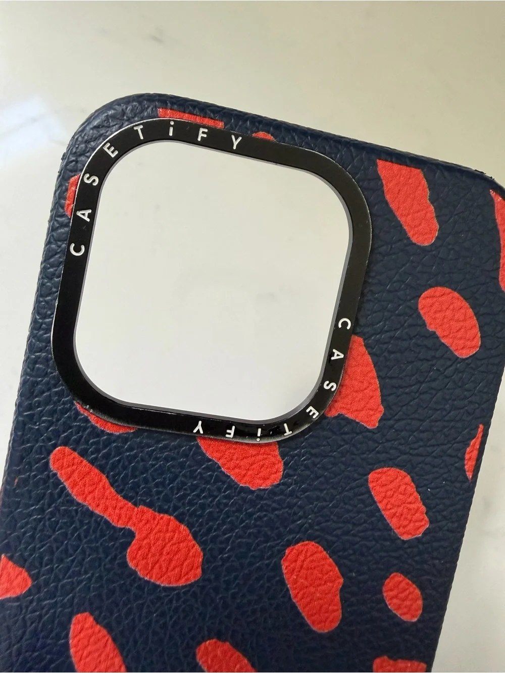 Clare V. x Casetify Navy with Poppy Jaguar Print Leather iPhone 15 Pro Case